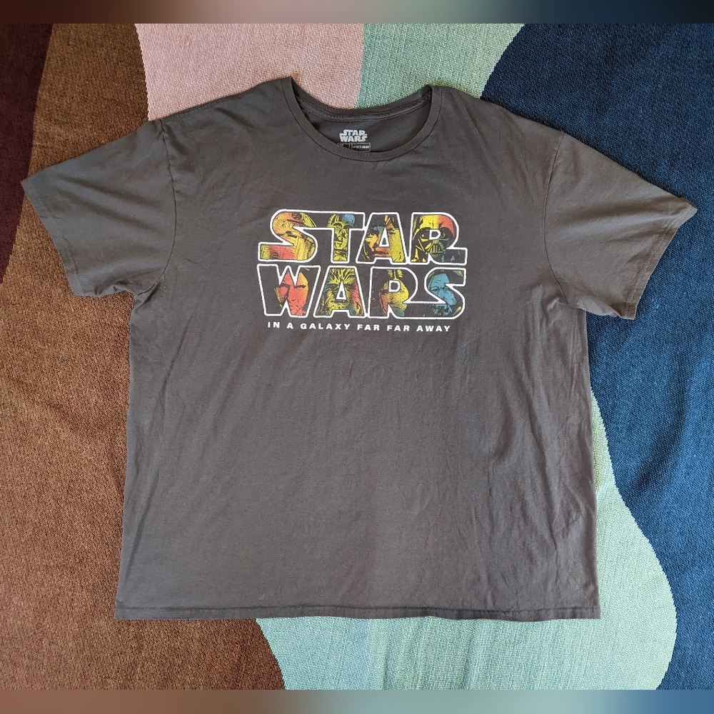 Star Wars Officially licensed Graphic Tee "In a Galaxy Far Far Away" Faces.